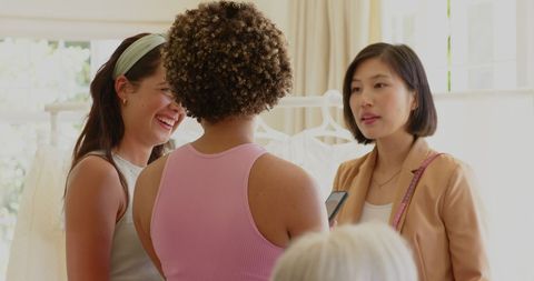 Women Preparing for Wedding Day in Bright Room