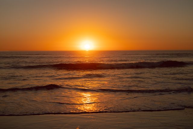 Stunning Sunset Over Calm Sea at Beach - Download Free Stock Photos Pikwizard.com