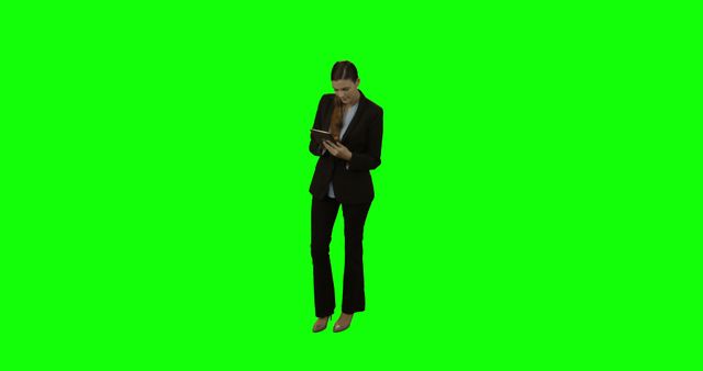 Businesswoman Using Digital Tablet Isolated on Green Background - Download Free Stock Images Pikwizard.com