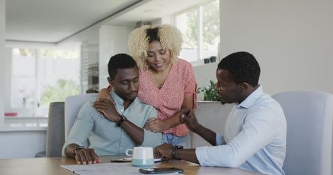 Friends Connecting Over Coffee and Talk in Bright Home
