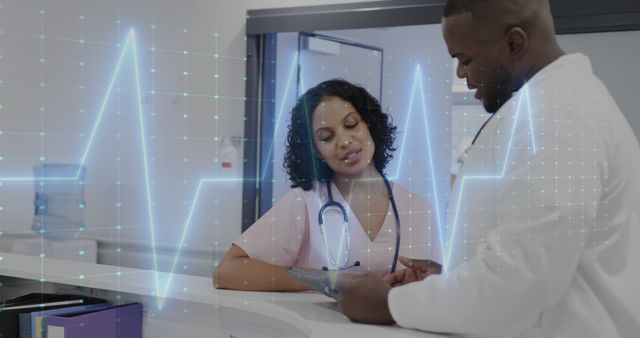 Doctors Discussing Patients' Medical Records with ECG Visualization - Download Free Stock Images Pikwizard.com