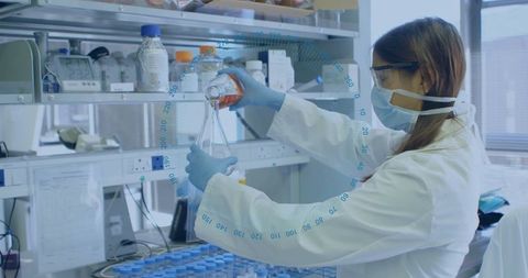 Female Scientist Conducting Experiment in Modern Laboratory - Download Free Stock Images Pikwizard.com