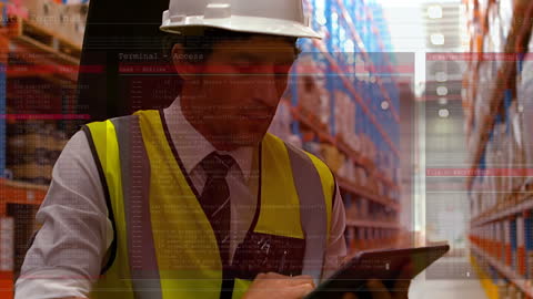 Warehouse Worker Analyzing Data on Tablet with Overlay