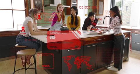 Young adults brainstorming at kitchen island with augmented reality overlays and devices
