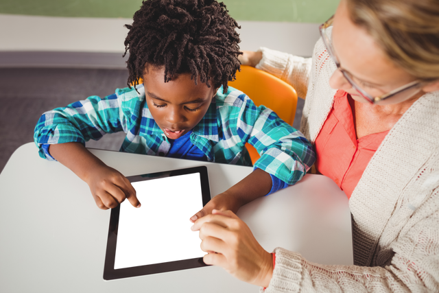 Transparent High Angle View of Teacher and Student Using Digital Tablet in Classroom - Download Free Stock Videos Pikwizard.com