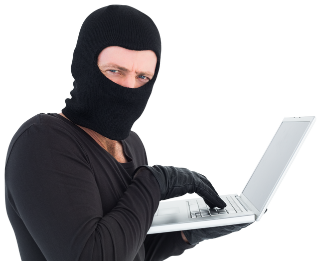 Transparent Masked Hacker in Black Attire Using Laptop - Download Free Stock Videos Pikwizard.com