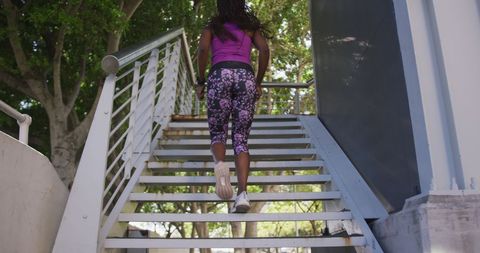 Woman Climbing Stairs Outdoors for Fitness - Download Free Stock Images Pikwizard.com