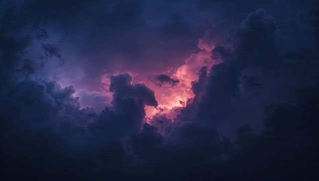 Majestic Storm Clouds Glowing with Twilight Colors