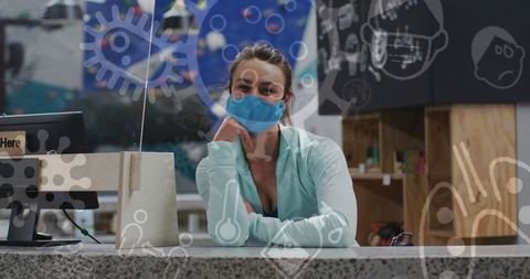 Masked woman at climbing gym with virus icons overlay