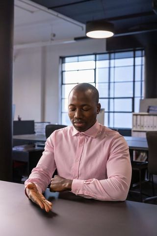 Professional Man in Modern Office Analyzing Serious Issues