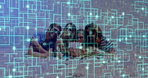 Friends on Beach Using Tablet with Digital Circuit Overlay