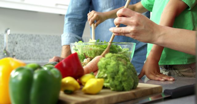 Family Preparing Fresh Salad Together in Modern Kitchen - Download Free Stock Images Pikwizard.com