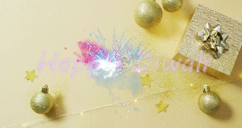 Festive Diwali Tabletop with Gold Ornaments and Gift Box