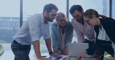 Corporate Team Collaborating in High-Tech Office Environment