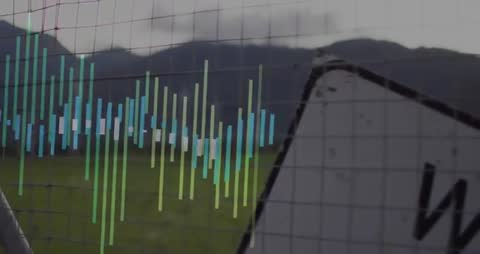 Wire Mesh with Digital Data Bars over Mountain Landscape