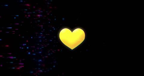 Glowing Yellow Heart with Colorful Sparkles on Dark Background - Download Free Stock Images Pikwizard.com