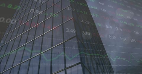 Reflections of Stock Market Charts on Office Building