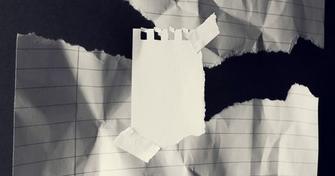 Abstract Torn Lined Paper with Taped Pieces Over Black Background - Download Free Stock Images Pikwizard.com
