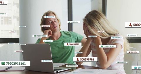 Stressed team workers with digital overload in modern office