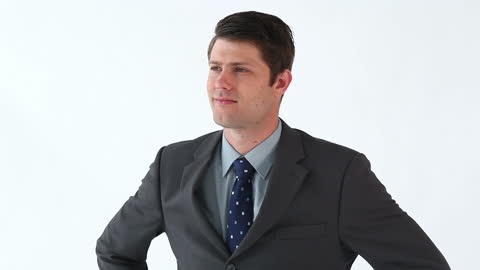 Confident Businessman in Formal Suit with Thoughtful Expression