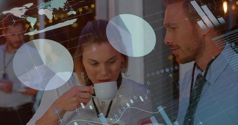 Business Professionals Discussing Data Analysis Strategies