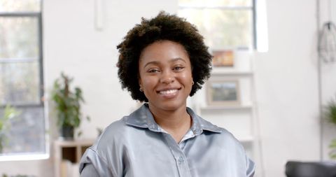 Smiling African American Businesswoman in Casual Office Environment