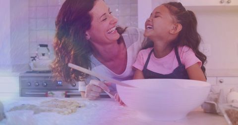 Mother and daughter enjoying kitchen time together
