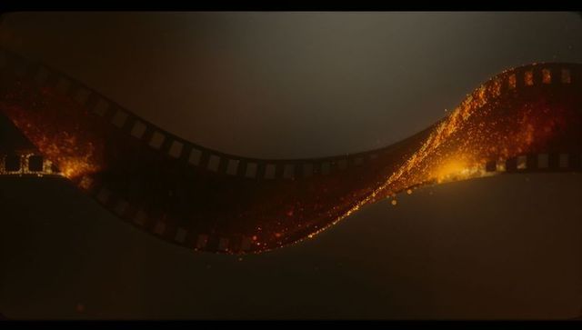 Twisting filmstrip illuminated by amber particles