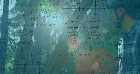 Young man analyses complex equations outdoors in serene woods