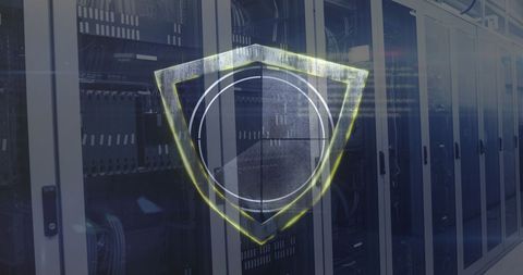 Image portrays a digital shield overlaying server racks, symbolizing cybersecurity. Useful for illustrating concepts of digital protection, data privacy, and internet security in technology or IT industry-related content.