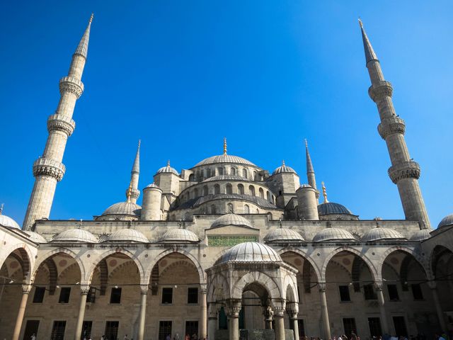 Exterior View of the Blue Mosque in Istanbul with Clear Blue Sky - Download Free Stock Photos Pikwizard.com