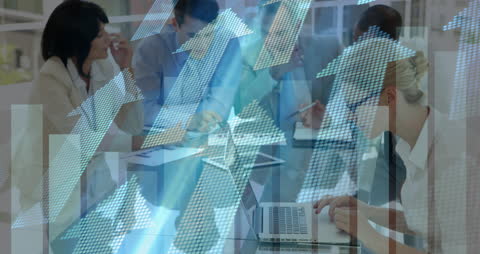 Diverse Business Team Analyzing Data with Rising Graph Arrows