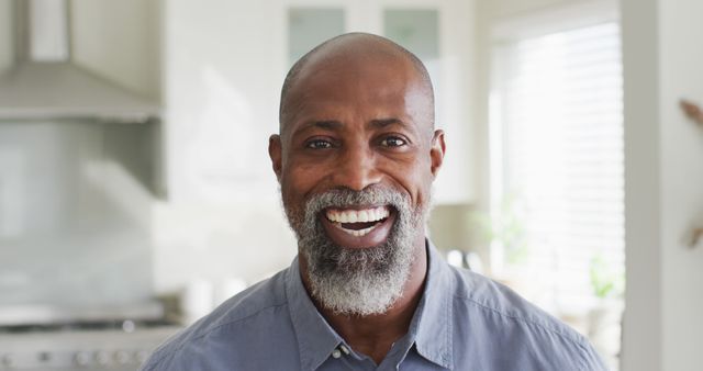 Image of african american man posing at camera. Leisure and relax, spending time at home.
