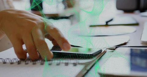 Innovative Digital Workspace with Smartphone and Graphic Overlay