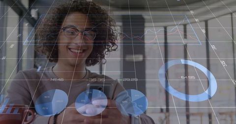 Man in Coworking Space using Smartphone with Data Overlays