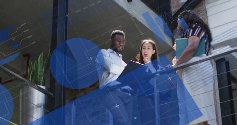 Business Team Collaborating on Project with Digital Overlay