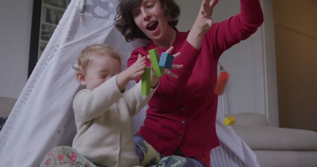 Mother and Child Playing With Building Blocks in Living Room - Download Free Stock Images Pikwizard.com