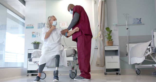 Senior Patient with Prosthetic Leg Receiving Medical Assistance - Download Free Stock Images Pikwizard.com