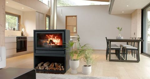 Cozy minimalist living space with scenic mountain view