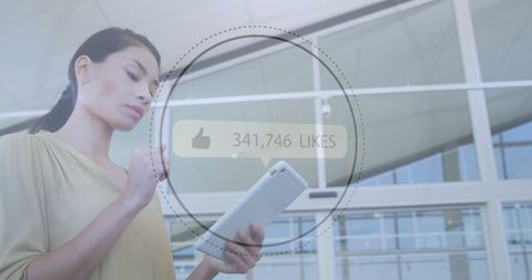 Businesswoman increasing social media influence with tablet