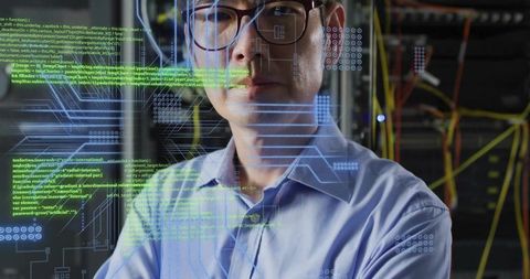 Korean it engineer standing in data center wearing glasses monitoring servers with hud code overlay
