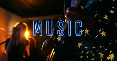 Young Adult Playing Guitar Under Neon Music Sign - Download Free Stock Images Pikwizard.com