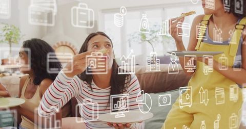 Three friends eating pizza on sofa at home with finance and tech graphics overlay for lifestyle