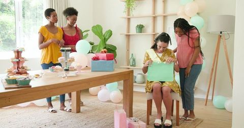 Joyful Birthday Celebration Among Diverse Group of Women