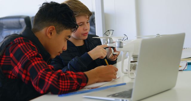 Two Boys Learning Drone Programming and Operation Indoors - Download Free Stock Images Pikwizard.com