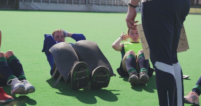 Field Hockey Team Training Session on Green Turf - Download Free Stock Images Pikwizard.com