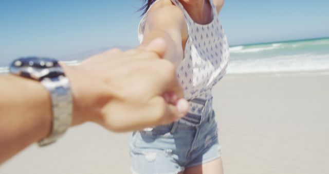 Couple Holding Hands on a Sunny Beach - Download Free Stock Images Pikwizard.com