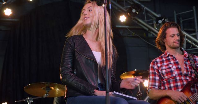 Young Musicians Rehearsing on Stage with Microphone and Guitar - Download Free Stock Images Pikwizard.com