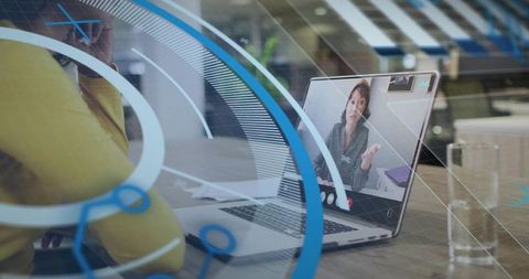 Remote collaboration with laptop video call and augmented reality overlay in open office