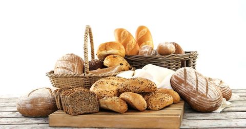 Assorted Freshly Baked Artisan Breads in Rustic Display - Download Free Stock Images Pikwizard.com